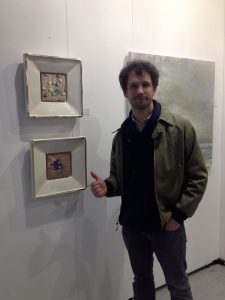 Italian colleague Simon Pasini in front of my work at the Affordable Art Fair in Milan (Gallery Terbeek), 2015